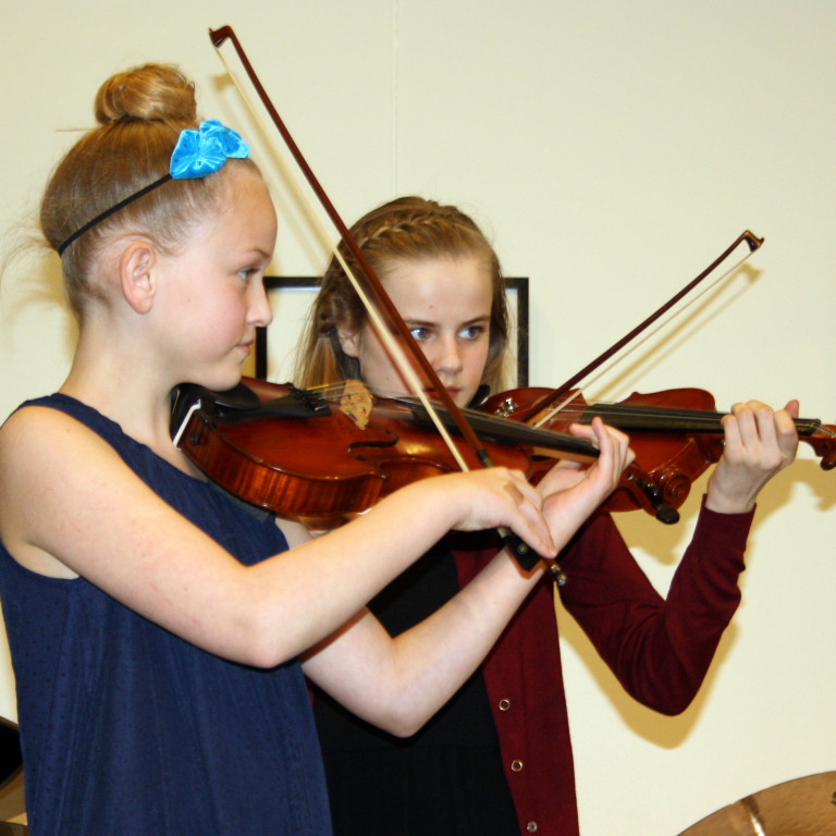 Texti með fréttamynd